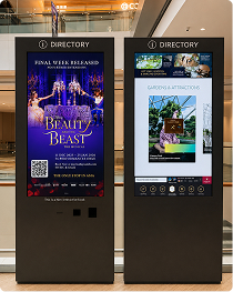 Shopping mall directory screens showing Beauty and the Beast musical ads
